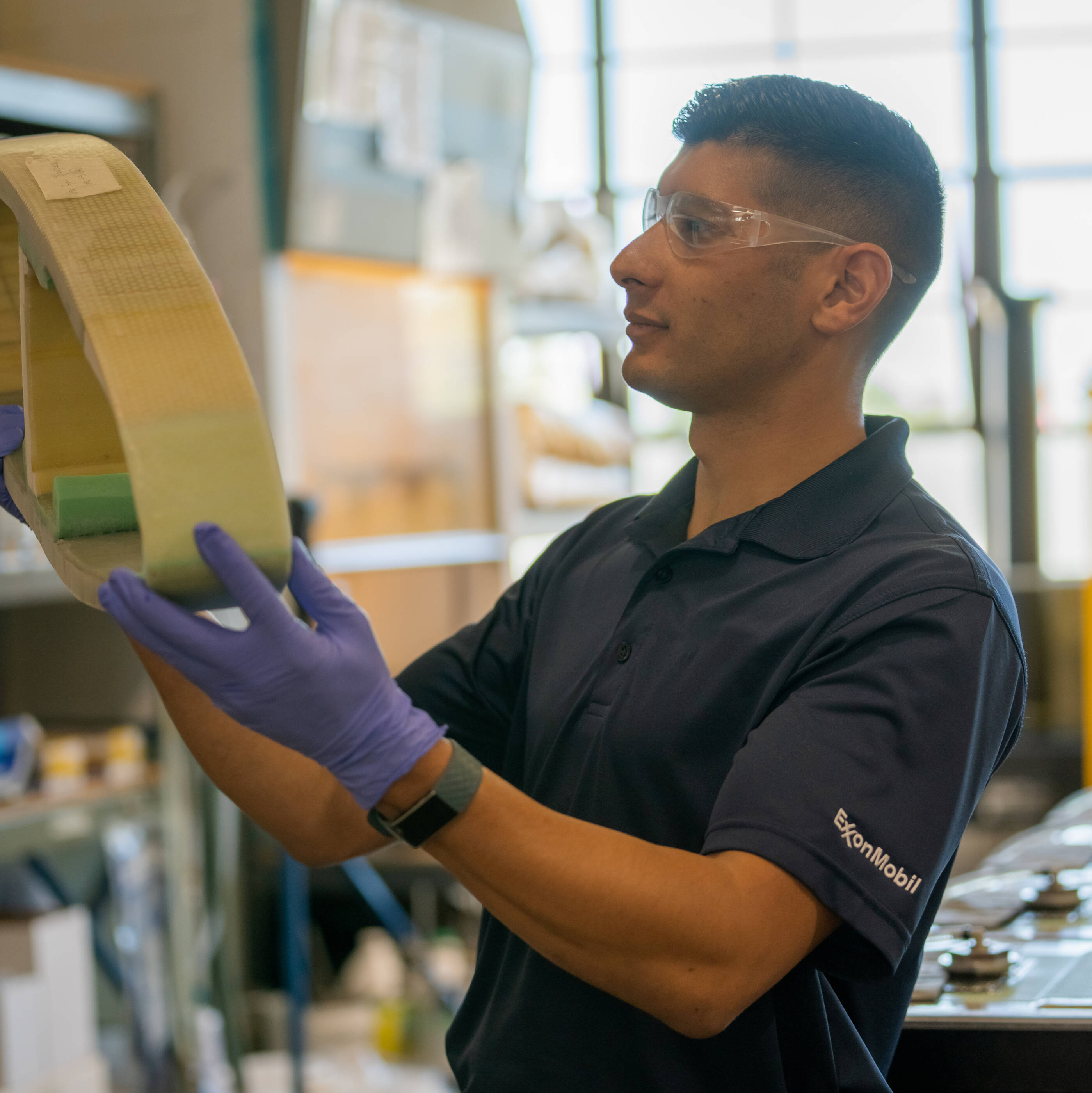 Employees in a plant working with Proxxima resin technology